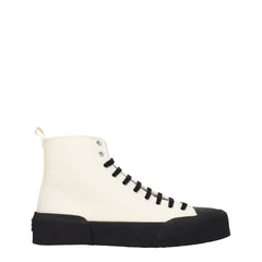 Baskets montantes en tissu beige Jil Sander dotées d'une empeigne minimaliste en toile et d'une semelle en caoutchouc nervurée surdimensionnée.