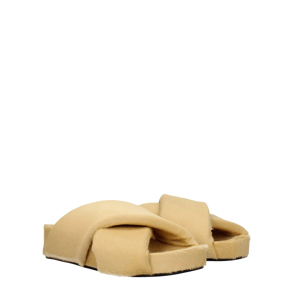 Bežové pantofle Jil Sander s vlasem