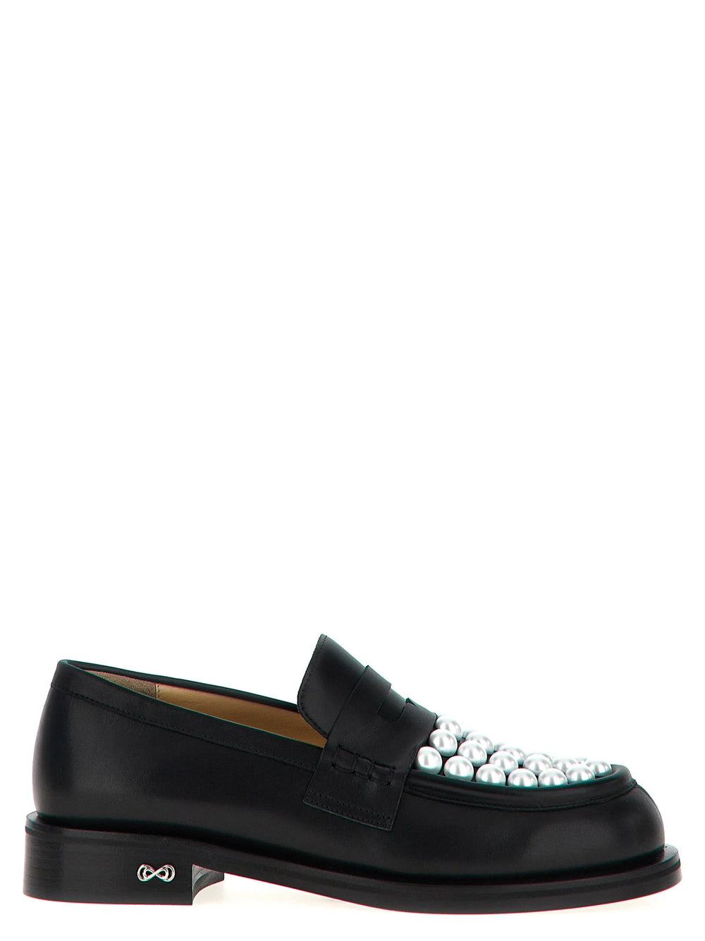 MACH & MACH bicolor calfskin slip-on loafers in black and white leather with a classic almond toe silhouette.