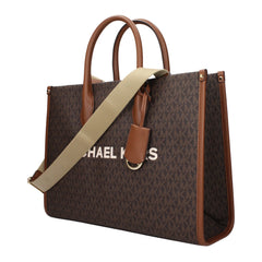 حقيبة يد من Michael Kors مصنوعة من القماش باللون البني