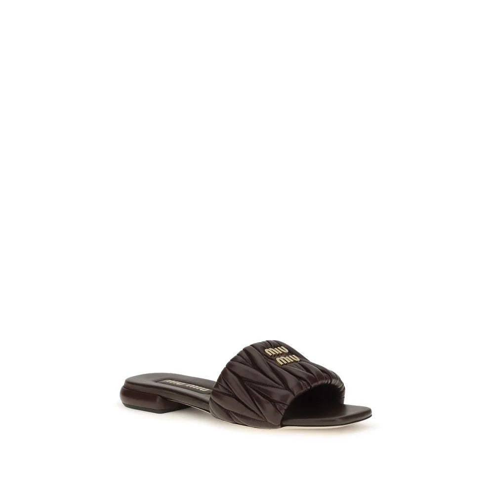 Miu Miu brune flade sandaler i kalveskind