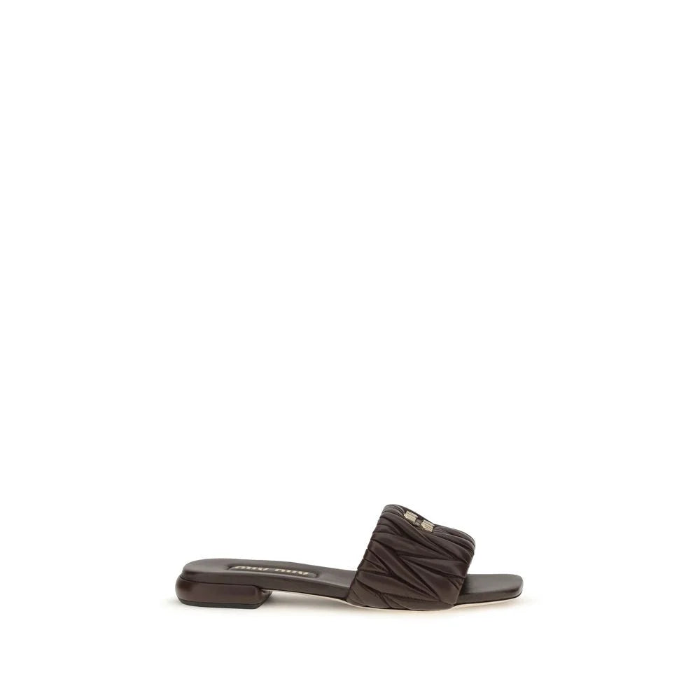 Miu Miu brune flade sandaler i kalveskind