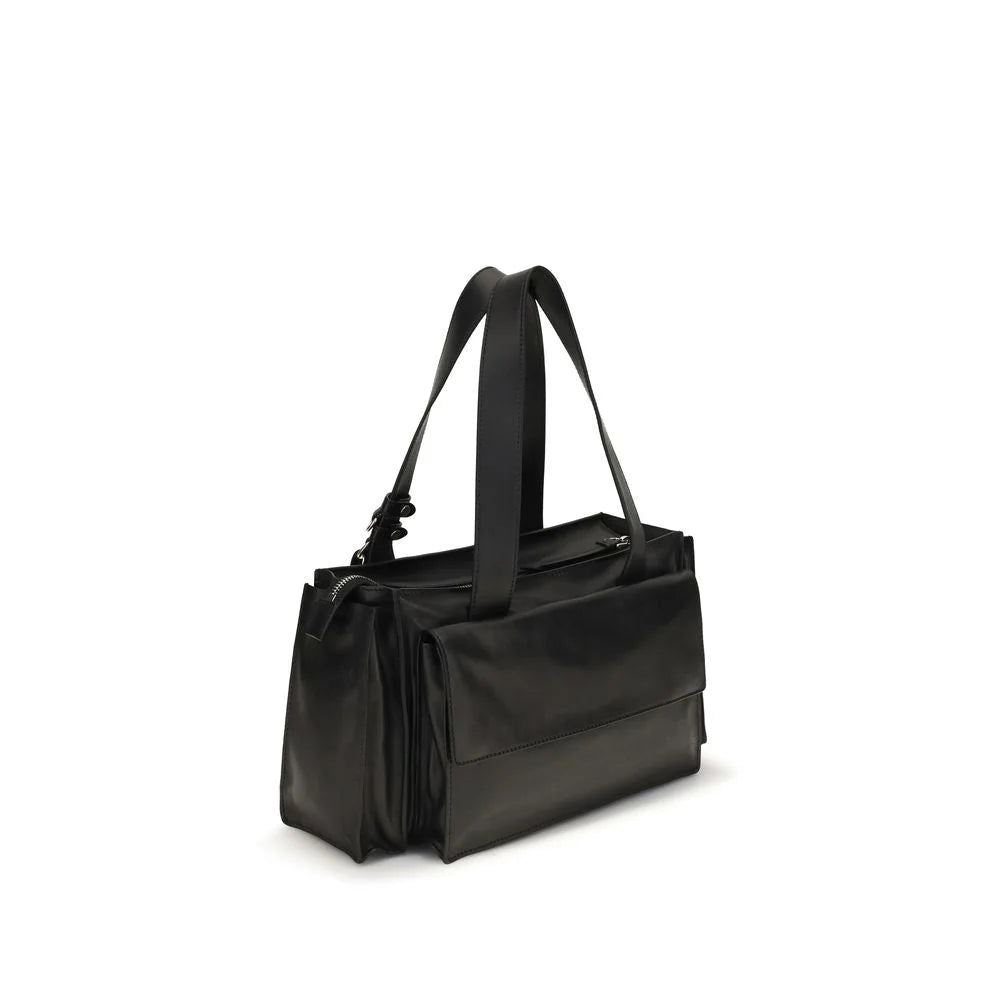Rear view of the Miu Miu calf leather shoulder bag, showcasing the seamless construction and smooth grain finish.