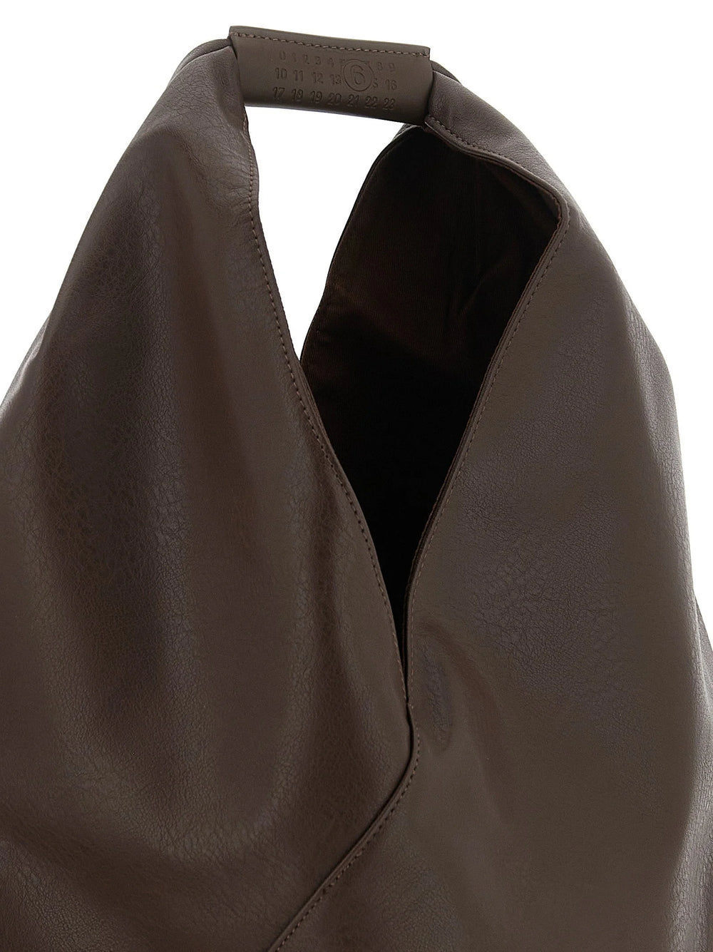 Vue arrière du cabas MM6 Maison Margiela, soulignant la ligne de couture blanche horizontale emblématique et le design minimaliste.
