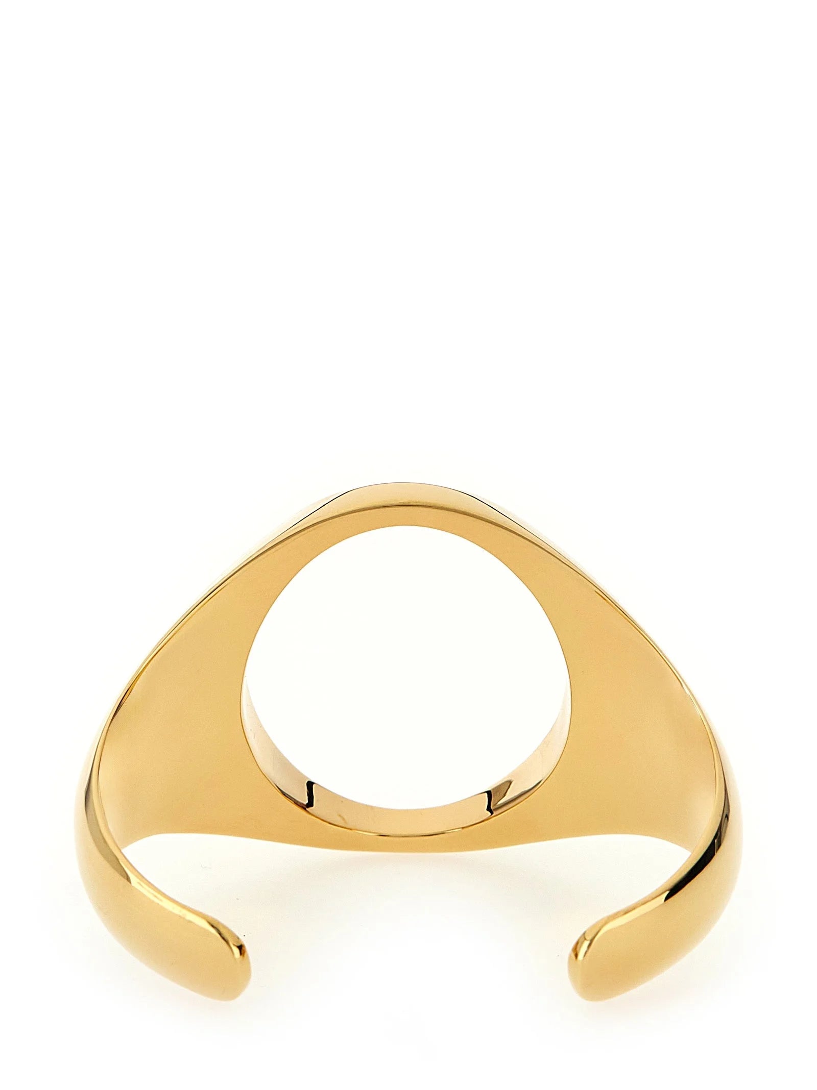 Side view of the MM6 Maison Margiela brass bracelet in polished gold, showcasing the sleek open-cuff design.