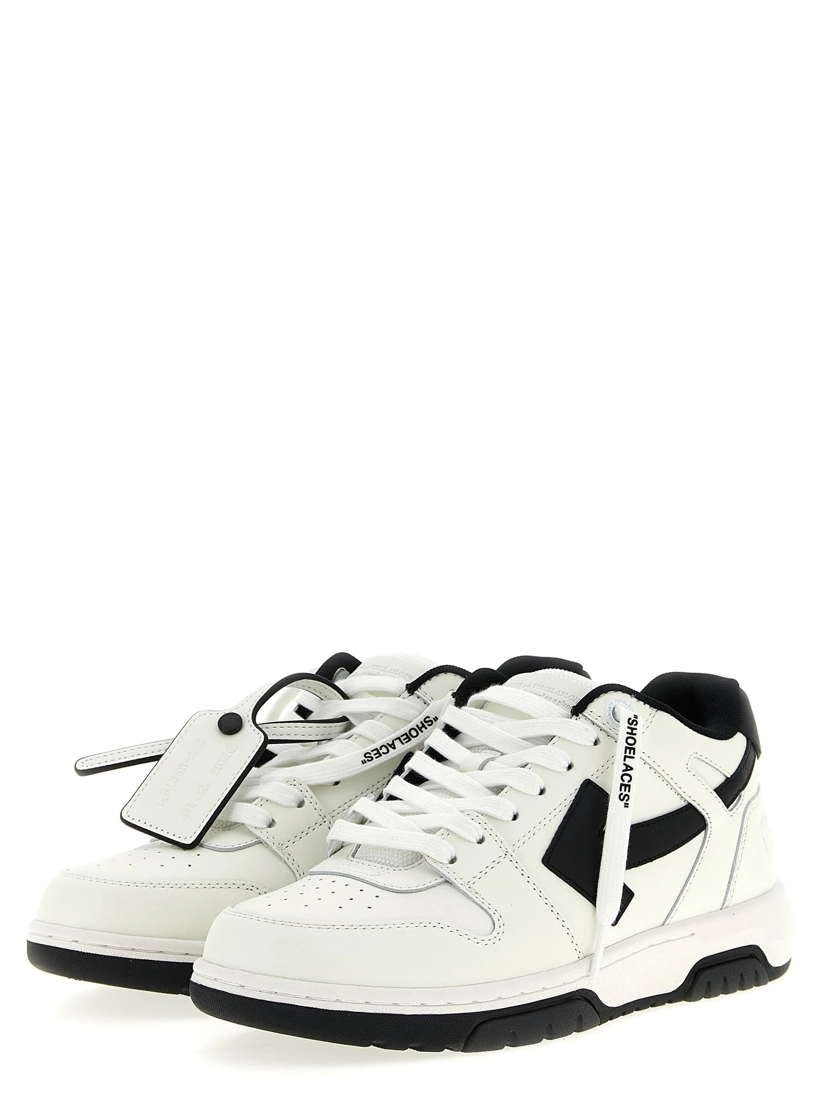 Side profile of Off-White bicolor sneakers showing the signature arrow motif and recycled textile construction.