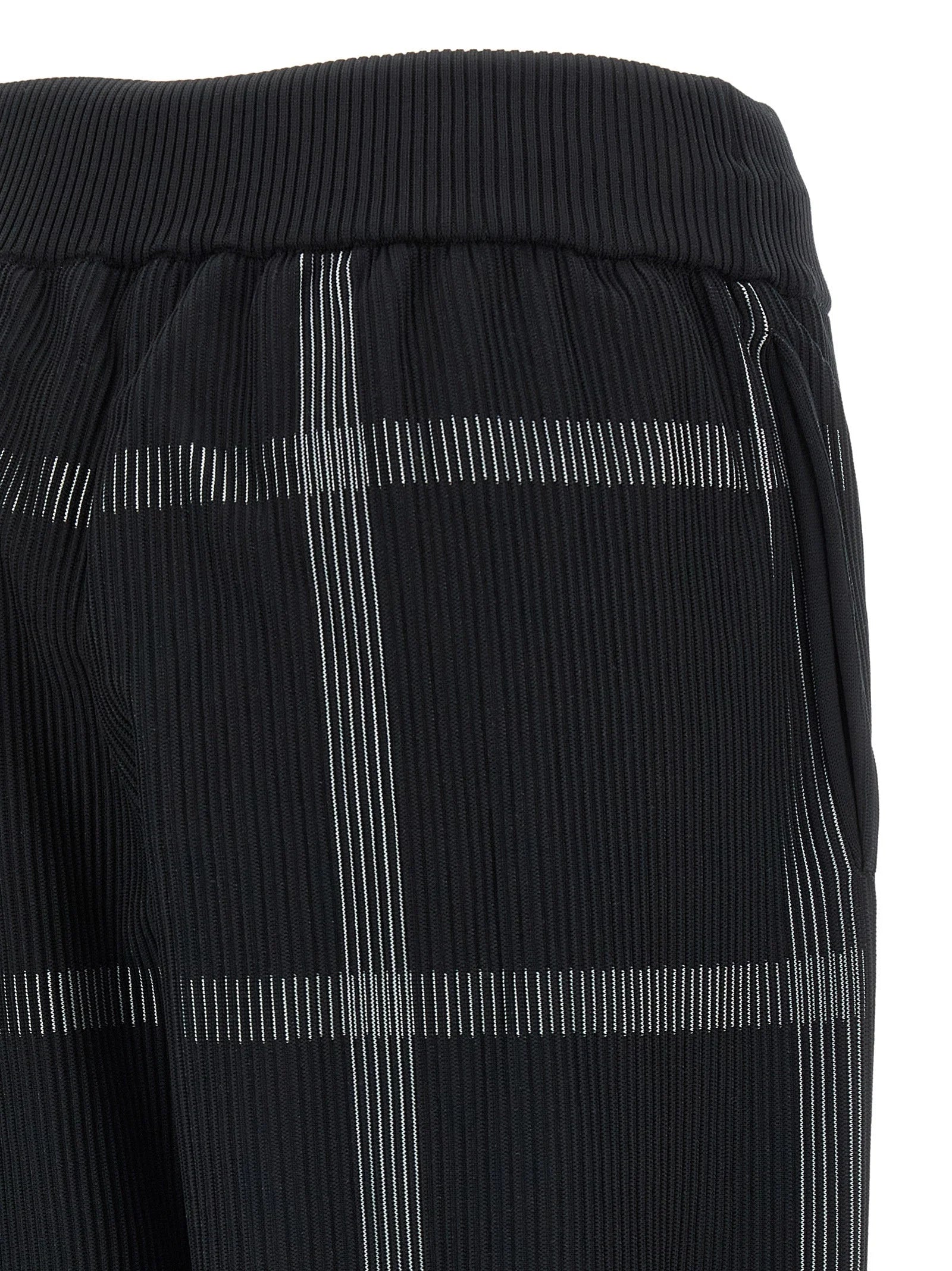 PLEATS PLEASE ISSEY MIYAKE Black Polyester Casual Pants - One Size