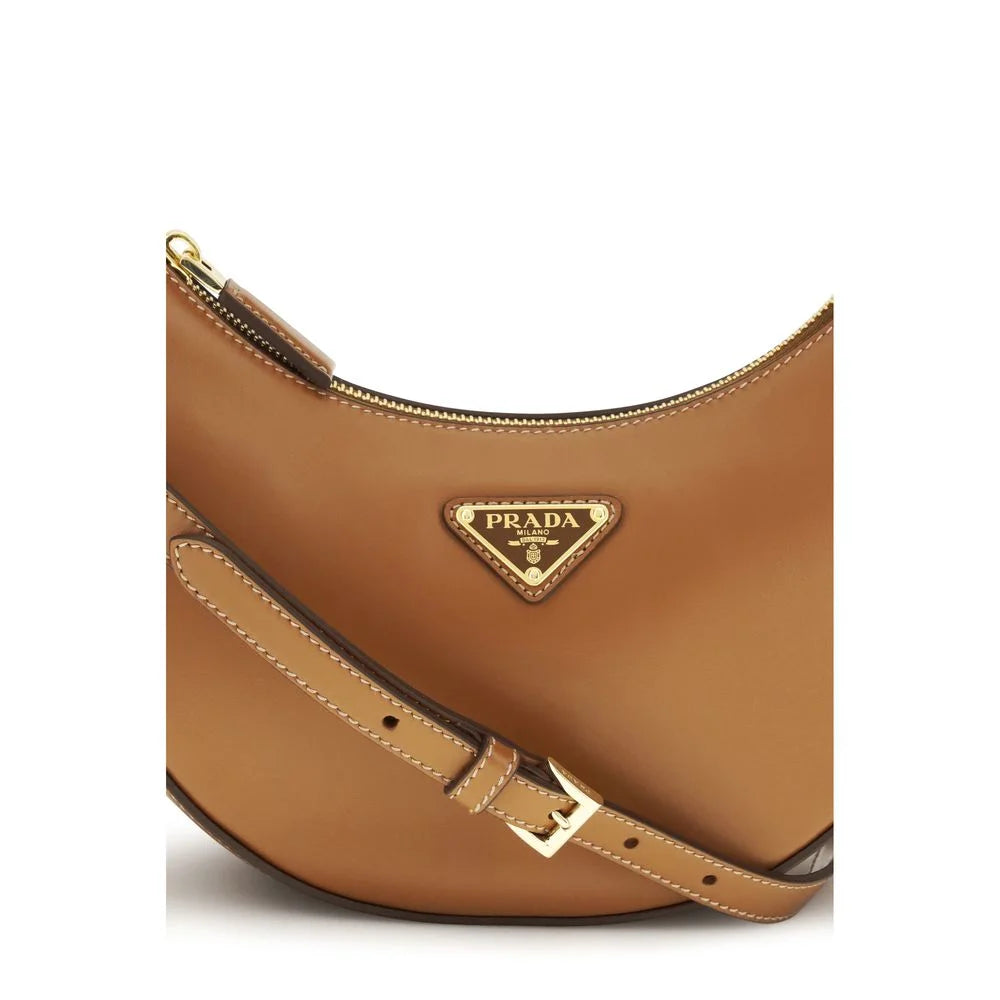 Bolso bandolera de ante de vaca beige de Prada