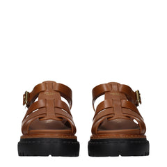 Sandales compensées en cuir marron Prada