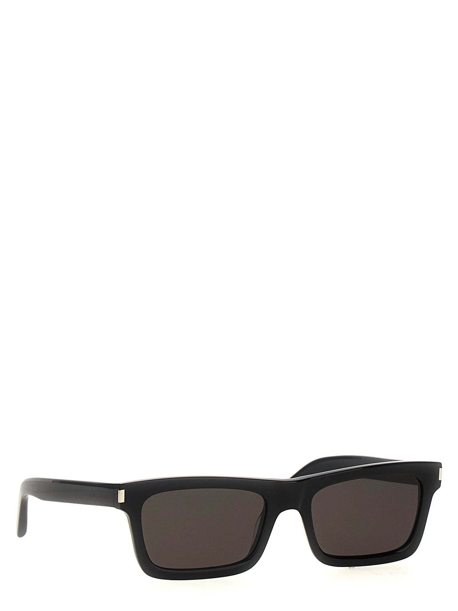 Vista lateral de las gafas de sol negras de Saint Laurent que muestra las patillas de acetato elegantes y la silueta refinada del diseñador.