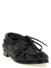Saint Laurent svarte kalveskinns slip-on loafers