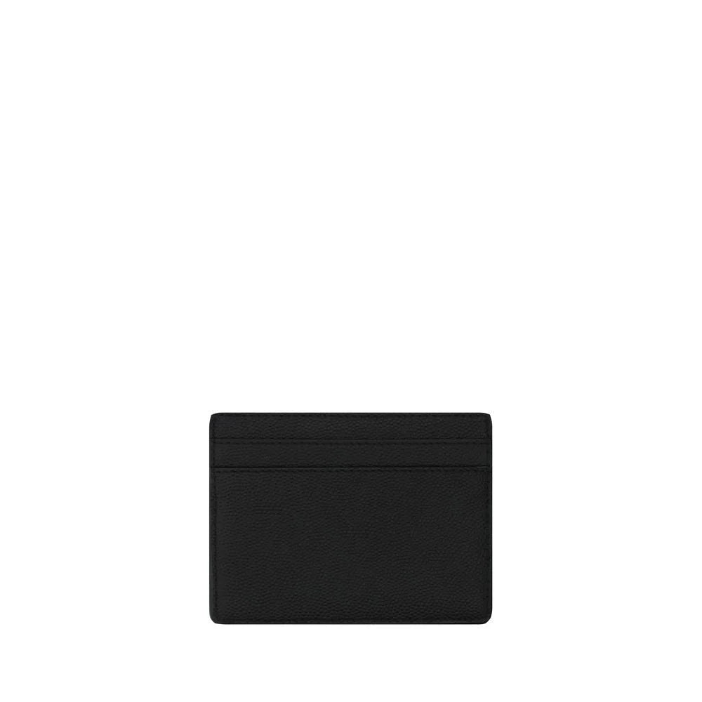 Rear view of Saint Laurent black leather card holder showing precise stitching and multiple card slots.