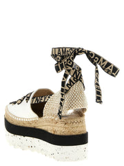 Rear view of the Stella McCartney cotton sandals highlighting the precise heel construction and neutral beige tone.