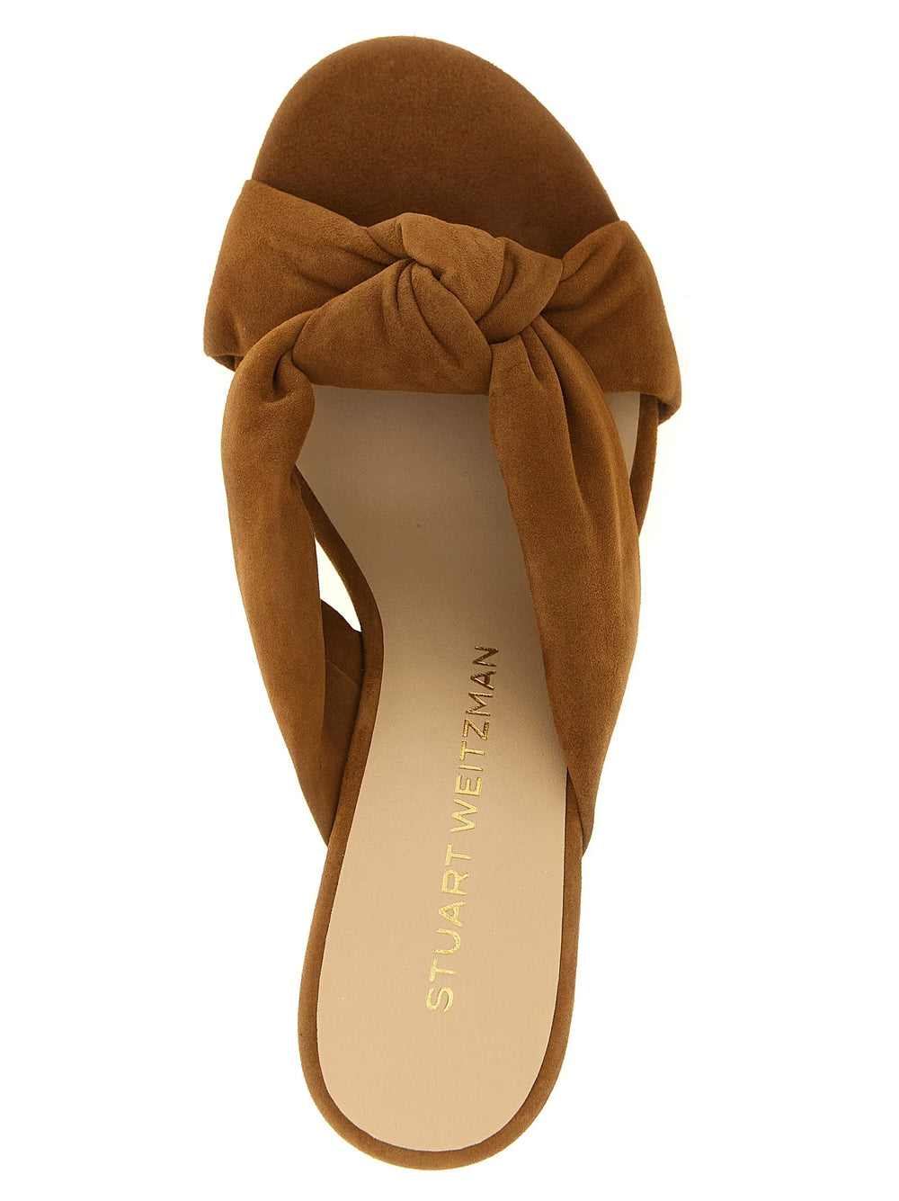Close-up detail of the Stuart Weitzman brown polyethylene material and cushioned footbed with subtle brand logo.