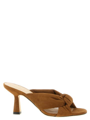 Stuart Weitzman brown polyethylene stiletto heel sandals featuring a minimalist strappy design and sleek silhouette.