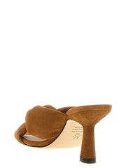 Rear view of the Stuart Weitzman stiletto sandals in brown, highlighting the precise heel construction and craftsmanship.