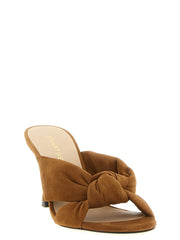 Side profile of Stuart Weitzman brown sandals showcasing the elegant high stiletto heel and refined ankle strap.