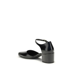 The Row Black Rubber Mid Heel Pumps