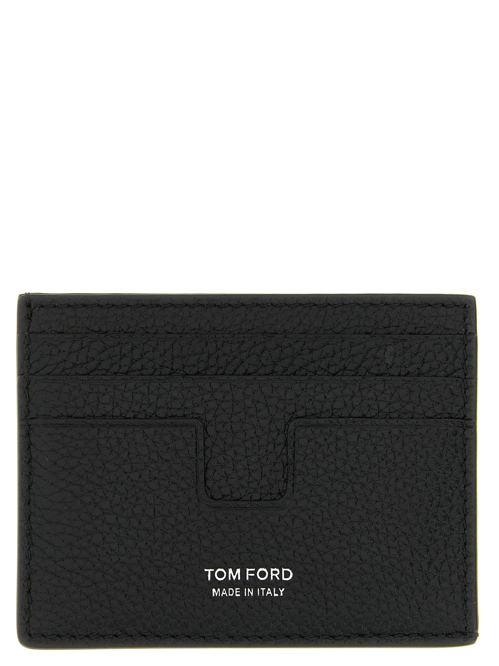 Εμπρόσθια άποψη του πορτοφολιού καρτών Tom Ford σε μαύρο δέρμα μοσχαριού με χρυσό λογότυπο και πολλές υποδοχές καρτών.