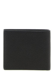 Interior view of the Tom Ford men's wallet in black leather showing multiple card slots and precise Italian craftsmanship.