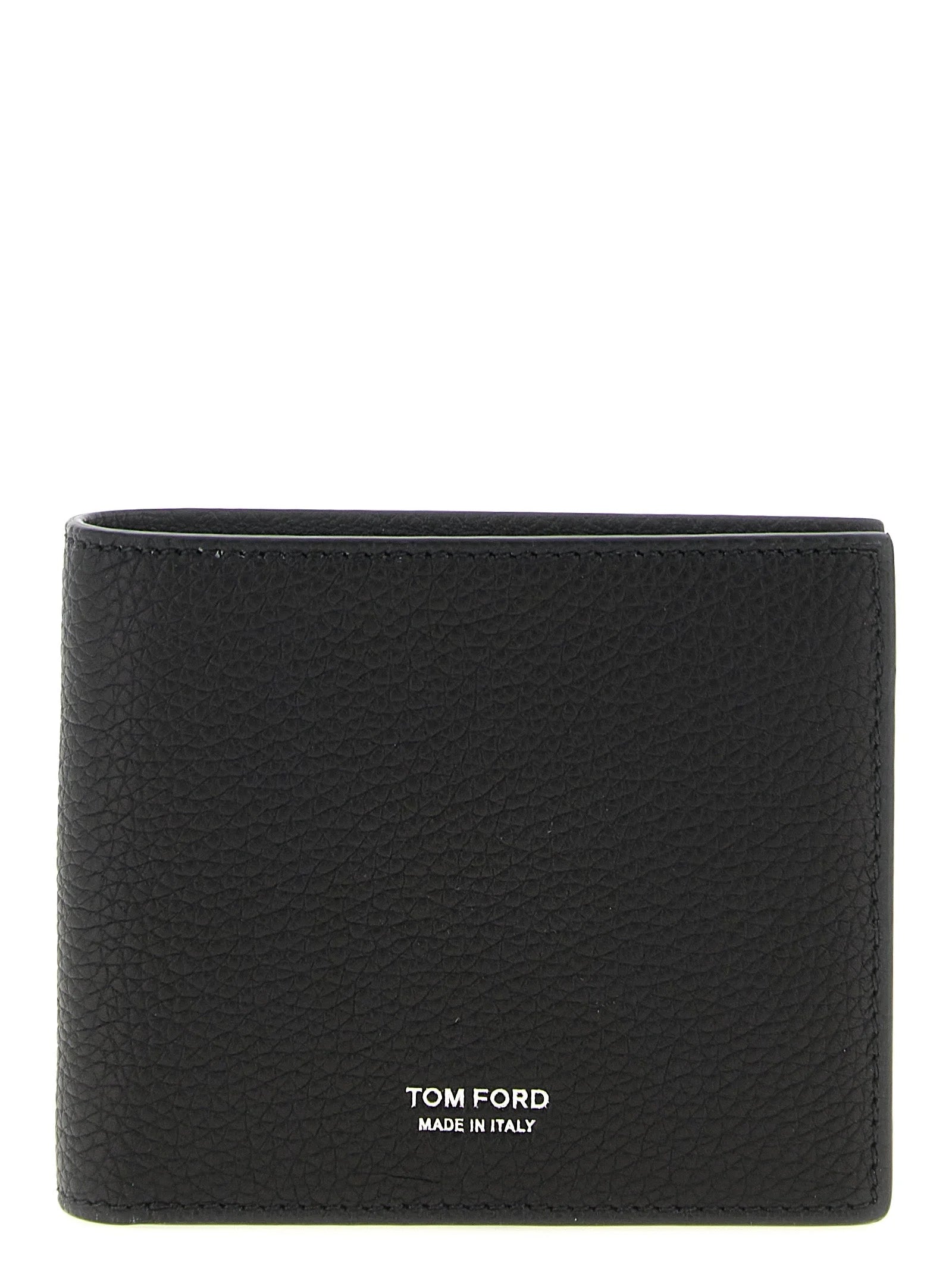 Front view of a Tom Ford black calfskin leather wallet featuring a subtle grained texture and gold-tone logo hardware.
