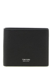 Front view of a Tom Ford black calfskin leather wallet featuring a subtle grained texture and gold-tone logo hardware.