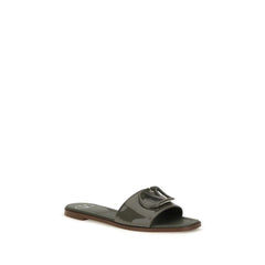 Sideprofil av Valentino Garavani Bos Taurus-flats i skinn med et minimalistisk bicolor-stroppedesign og slank såle.