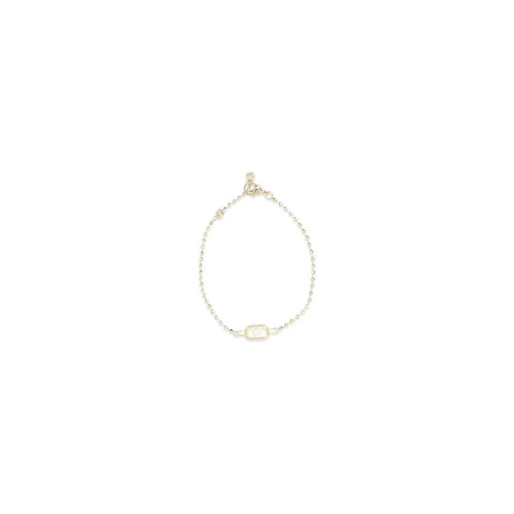 Sideprofil af Valentino Garavani armbånd i forgyldt metal, der fremhæver den skulpturelle kurve og det raffinerede håndværk.