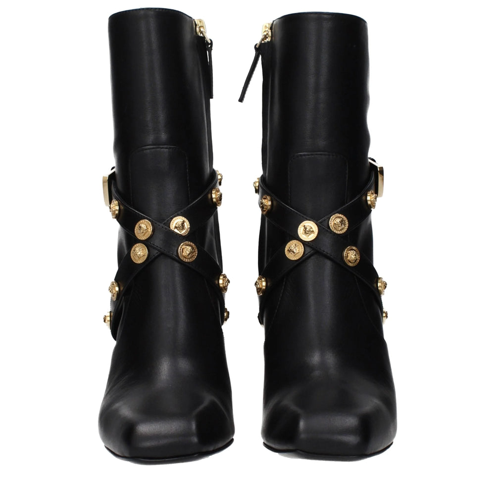 Stivali alla caviglia in pelle nera Versace