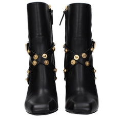 Stivali alla caviglia in pelle nera Versace